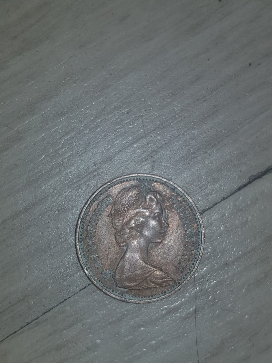 Half-Penny-Strike-Error-Or-Just-A-Old-Damaged-Coin